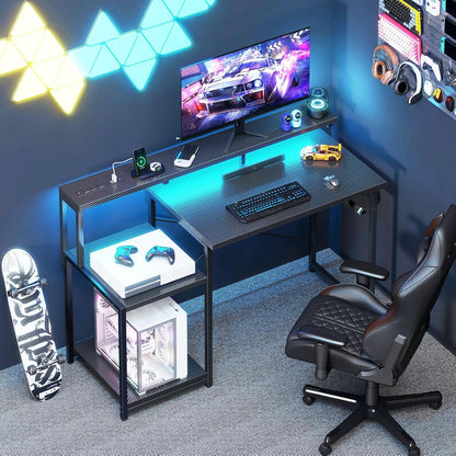Escritorio Gaming de 48 Pulgadas con Luces LED y Toma de Corriente,  de Oficina con Estantes de Almacenamiento, Escritorio Reversible con Estante para Monitor y Gancho para Auriculares