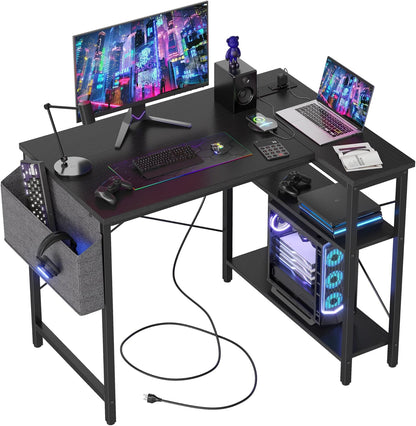 Escritorio Gaming en Forma de L Pequeño , con Tomas de Corriente, Estantes Reversibles para Estudio, Mesa de Escritura para Hogar, Oficina, Dormitorio o Sala de Estar, 40 Pulgadas, Negro